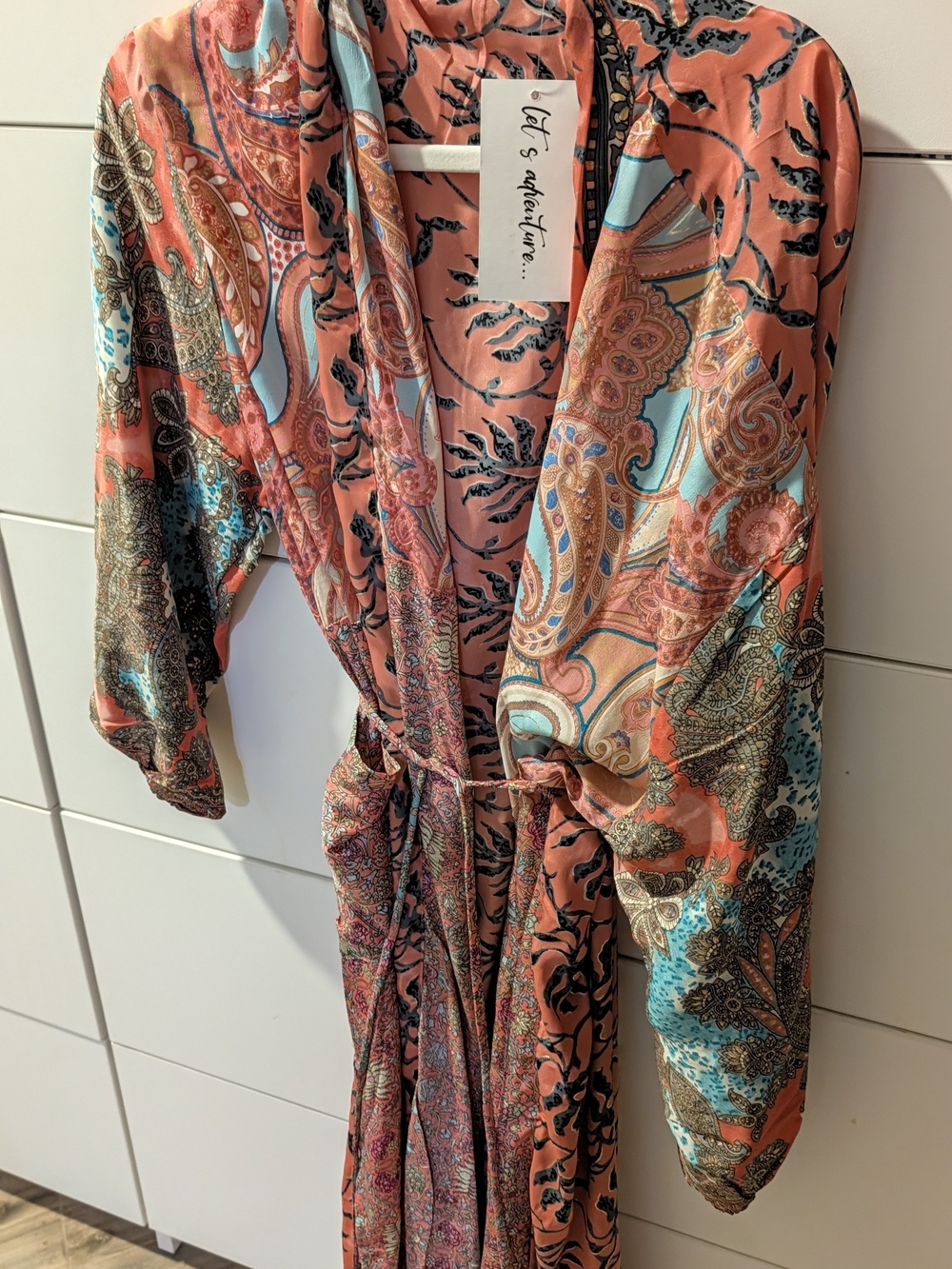 Women's patterned lightweight jacket with brand tag